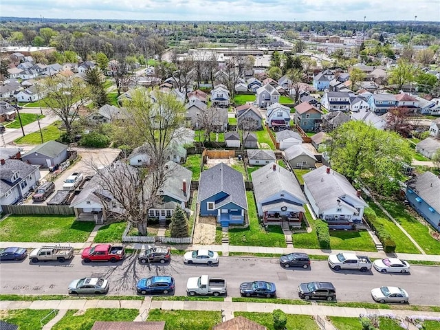 birds eye view of property with a residential view