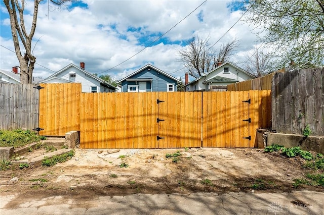 view of yard with a gate and fence