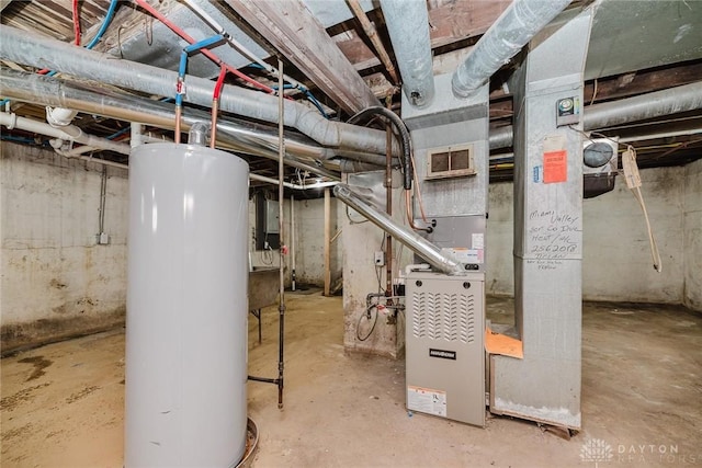 unfinished basement featuring visible vents and gas water heater