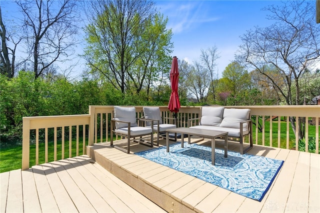 wooden terrace with an outdoor hangout area