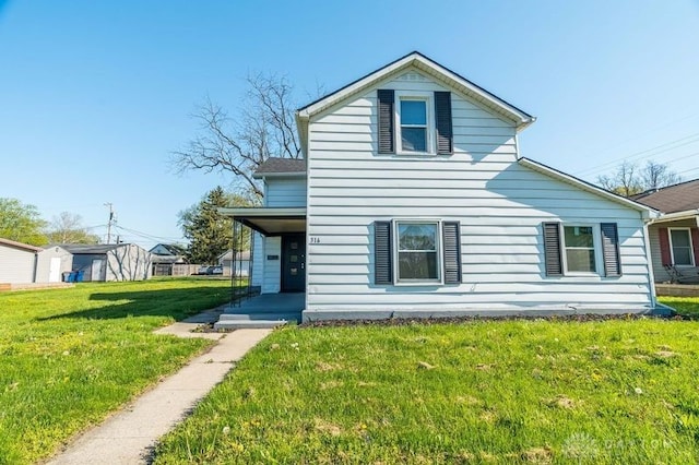 316 5th St, Piqua, OH 45356 - view of front of property featuring a porch and a front yard