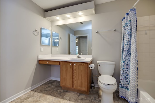 full bathroom featuring vanity, toilet, baseboards, and shower / bath combo with shower curtain
