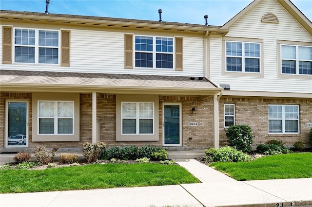 2454 Cabbage Key Dr, Miamisburg, OH 45342 - view of property with a front lawn and brick siding