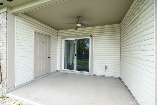 2454 Cabbage Key Dr, Miamisburg, OH 45342 - view of exterior entry featuring ceiling fan, brick siding, and a patio area