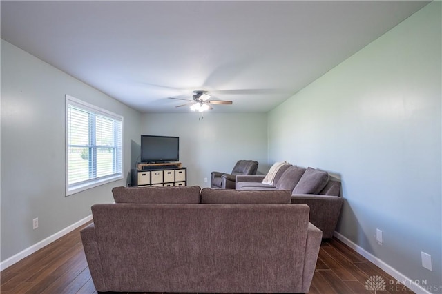 4100 Joshane St, Springfield, OH 45502 - living area with dark wood finished floors, a ceiling fan, and baseboards