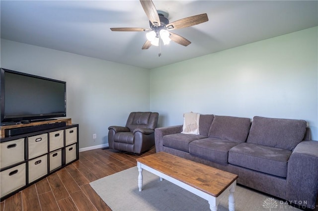 4100 Joshane St, Springfield, OH 45502 - living room featuring baseboards, dark wood-type flooring, and ceiling fan