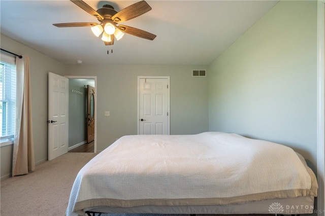 4100 Joshane St, Springfield, OH 45502 - bedroom featuring baseboards, visible vents, carpet, and ceiling fan