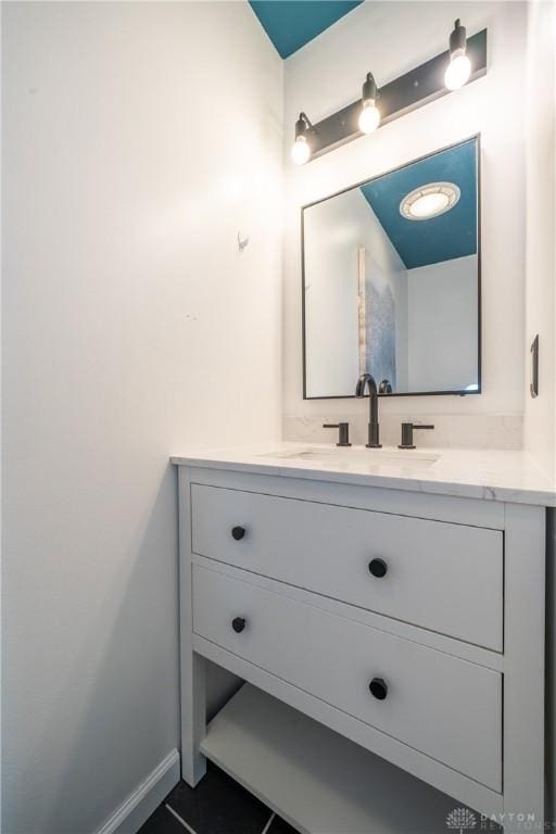 4100 Joshane St, Springfield, OH 45502 - bathroom featuring baseboards and vanity