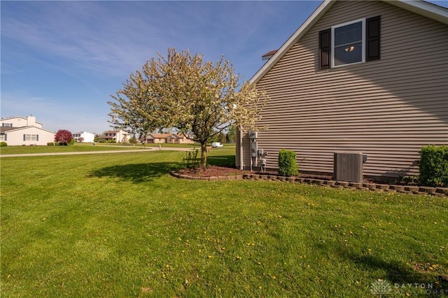 4100 Joshane St, Springfield, OH 45502 - view of property exterior featuring a lawn and central air condition unit