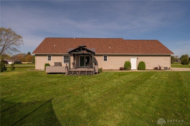 4100 Joshane St, Springfield, OH 45502 - back of property featuring a lawn and a wooden deck