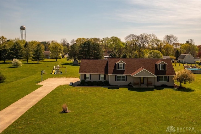 4100 Joshane St, Springfield, OH 45502 - cape cod home with a porch, driveway, and a front lawn