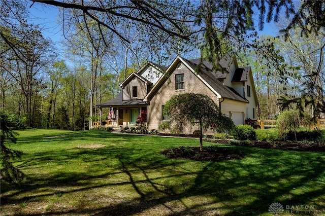 9171 Big Oak Dr, Washington Twp, OH 45458 - view of front of home featuring a porch and a front yard