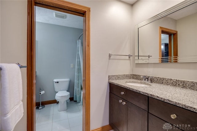 9171 Big Oak Dr, Washington Twp, OH 45458 - full bath featuring tile patterned floors, vanity, a shower with curtain, toilet, and baseboards