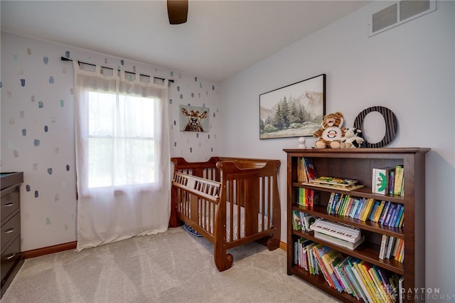 9171 Big Oak Dr, Washington Twp, OH 45458 - bedroom with carpet, baseboards, ceiling fan, and a nursery area