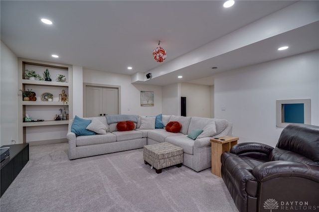 9171 Big Oak Dr, Washington Twp, OH 45458 - living room featuring light carpet, recessed lighting, and built in shelves