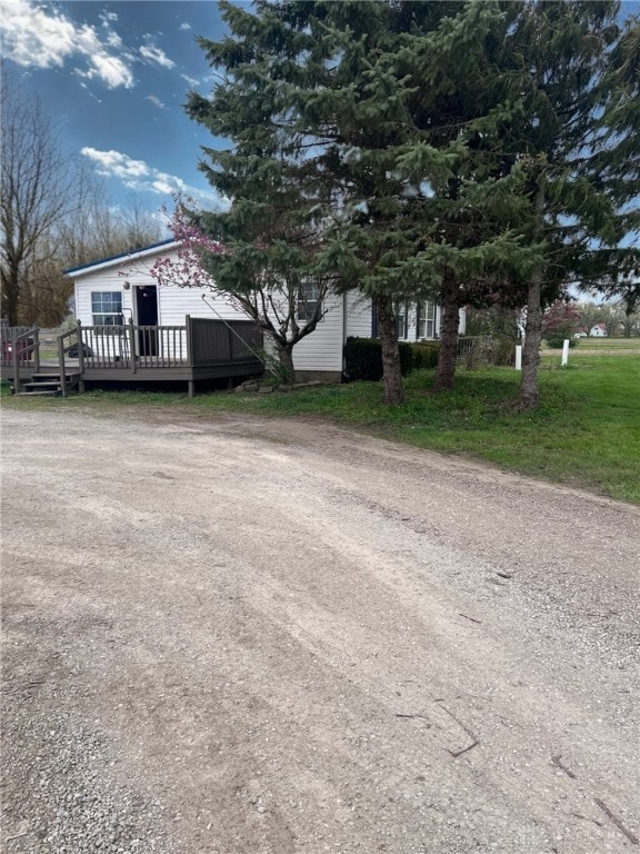 14384 NW US Highway 35, Jeffersonville, OH 43128 - view of yard with a wooden deck