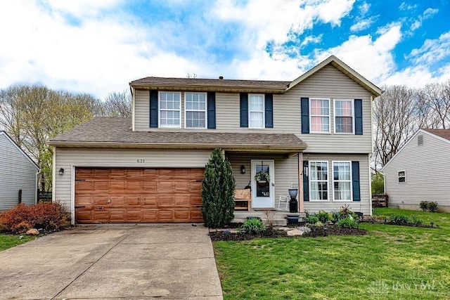 631 Alpine Pl, Trenton, OH 45067 - traditional-style home with a front yard and concrete driveway