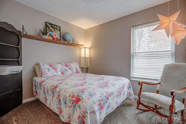631 Alpine Pl, Trenton, OH 45067 - bedroom with baseboards, carpet floors, and a textured ceiling