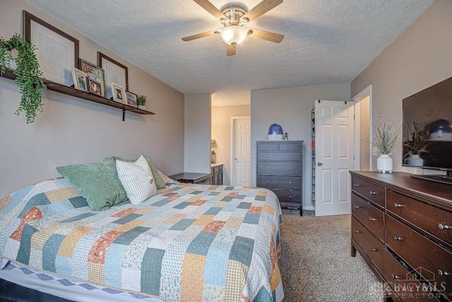 631 Alpine Pl, Trenton, OH 45067 - carpeted bedroom with a textured ceiling and a ceiling fan