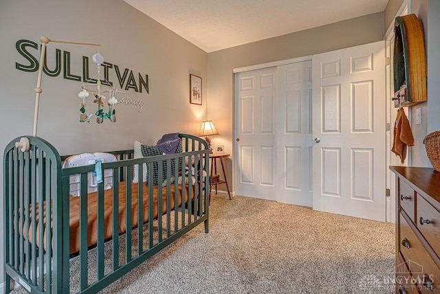 631 Alpine Pl, Trenton, OH 45067 - bedroom with carpet floors, a closet, and a crib
