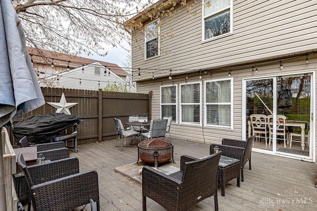 631 Alpine Pl, Trenton, OH 45067 - wooden terrace featuring outdoor dining space, an outdoor fire pit, and fence