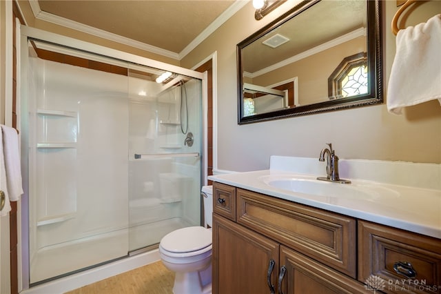 6139 N State Route 48, Clearcreek Twp, OH 45036 - full bathroom with a shower stall, toilet, wood finished floors, vanity, and ornamental molding