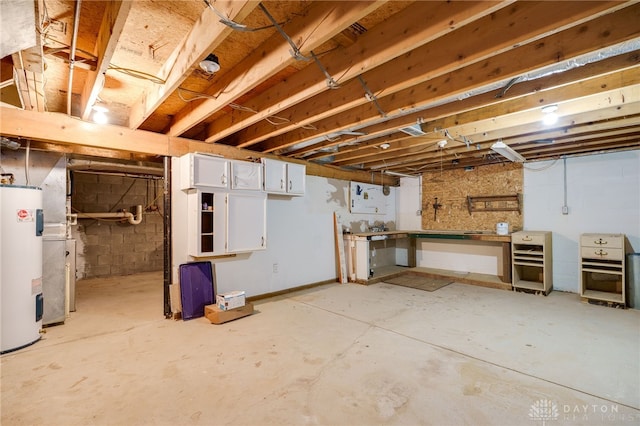 6139 N State Route 48, Clearcreek Twp, OH 45036 - unfinished below grade area with a workshop area and electric water heater