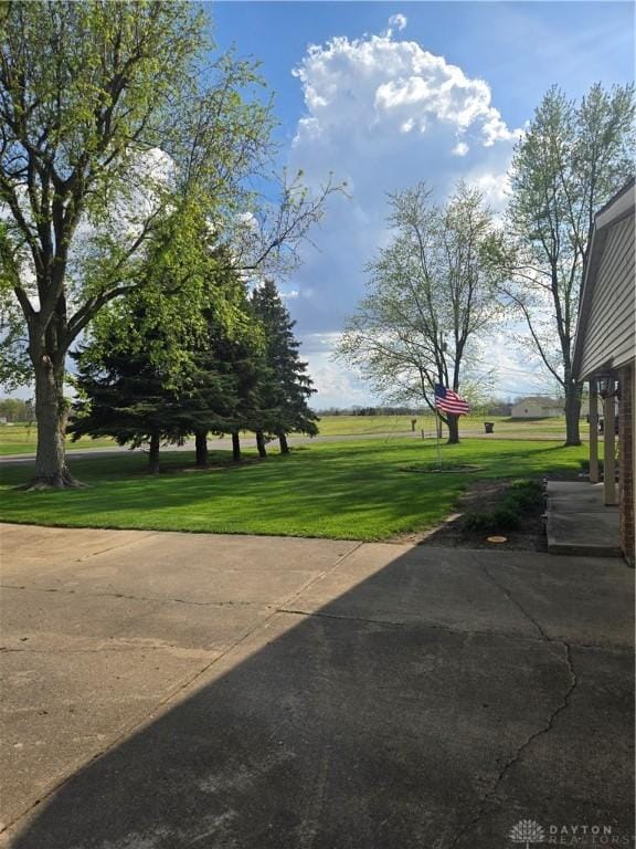 surrounding community with a lawn