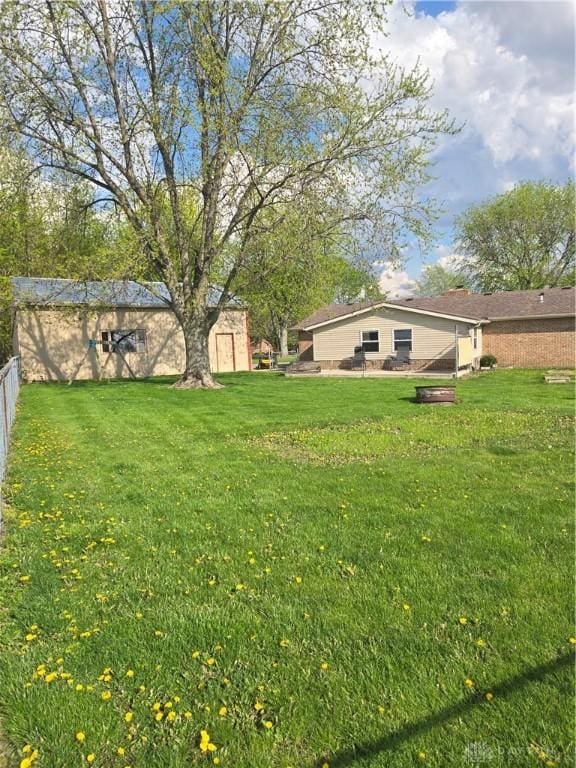 view of yard with fence