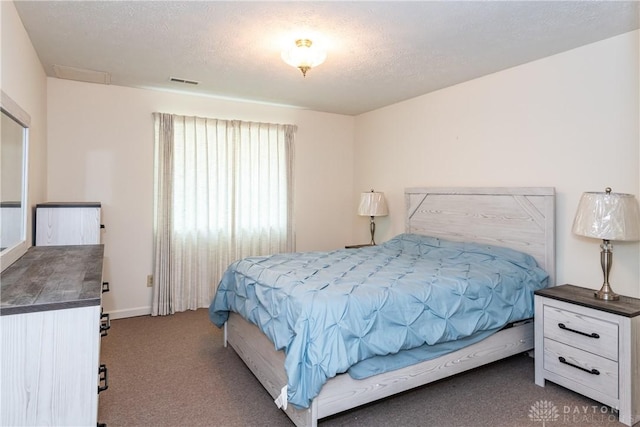 1405 Ashworth Ct, Dayton, OH 45459 - carpeted bedroom featuring a textured ceiling and baseboards