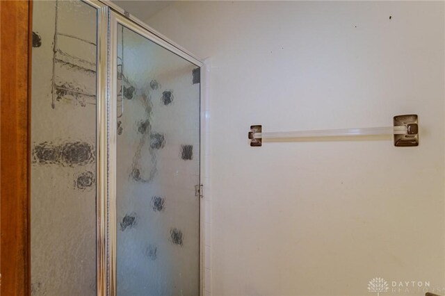 bathroom with a stall shower