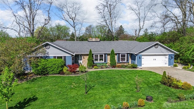 ranch-style home featuring a chimney, brick siding, driveway, a front yard, and an attached garage