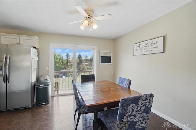 dining area featuring a ceiling fan and dark wood finished floors