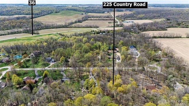 aerial view featuring a rural view and a forest view