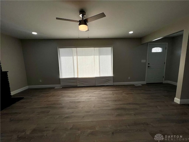 unfurnished living room featuring baseboards, recessed lighting, a ceiling fan, and dark wood finished floors