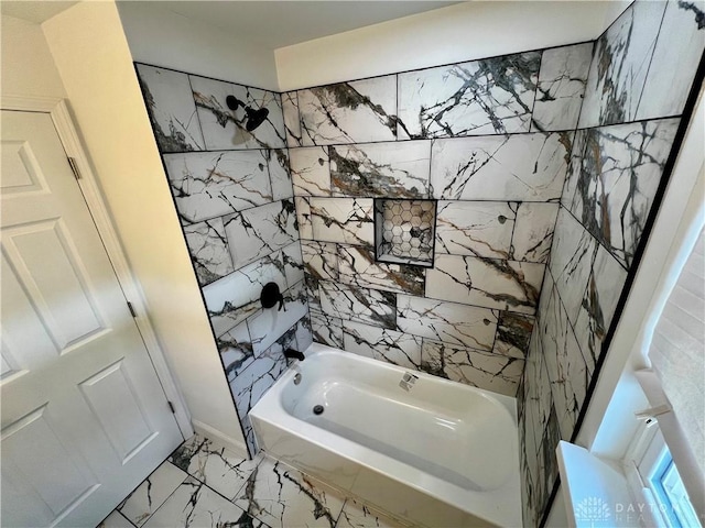 bathroom with shower / bathing tub combination and marble finish floor