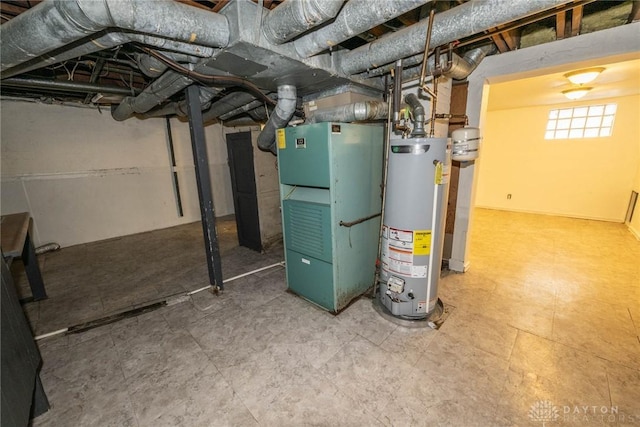 basement with water heater and heating unit