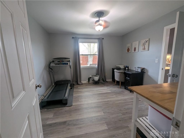 home office featuring light wood-style floors