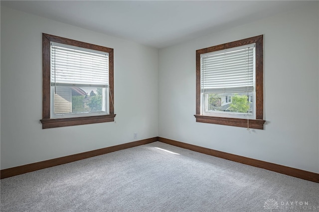 9 Wiltshire Blvd, Oakwood, OH 45419 - empty room with plenty of natural light, baseboards, and carpet floors