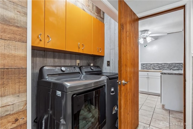 5262 Bittersweet Dr, Washington Twp, OH 45429 - laundry room featuring light tile patterned floors, independent washer and dryer, a ceiling fan, and cabinet space