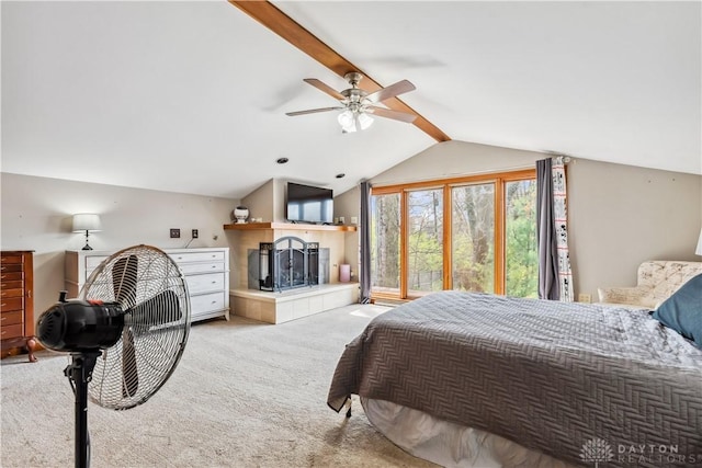 5262 Bittersweet Dr, Washington Twp, OH 45429 - bedroom with lofted ceiling with beams, a tile fireplace, and carpet