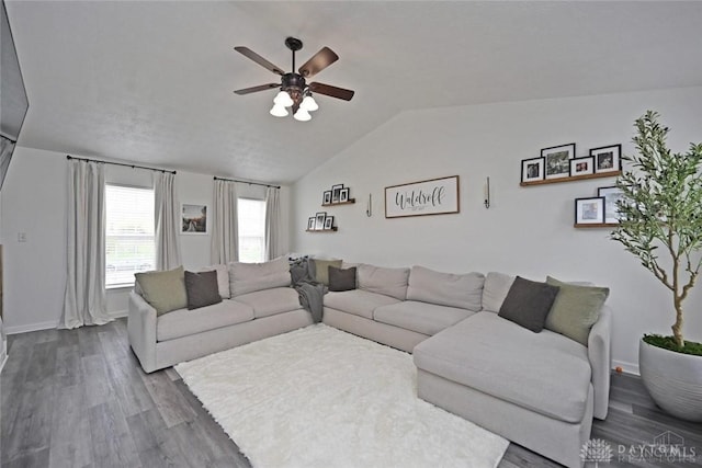 171 Pleasant Hill Blvd, Franklin, OH 45005 - living room featuring dark wood-style flooring, ceiling fan, vaulted ceiling, and baseboards