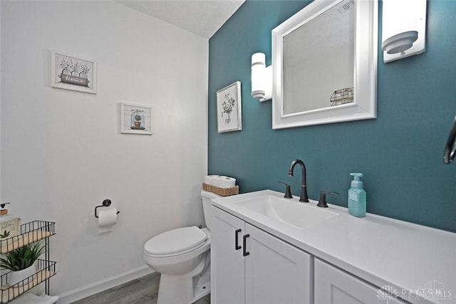 171 Pleasant Hill Blvd, Franklin, OH 45005 - bathroom featuring toilet, baseboards, wood finished floors, and vanity