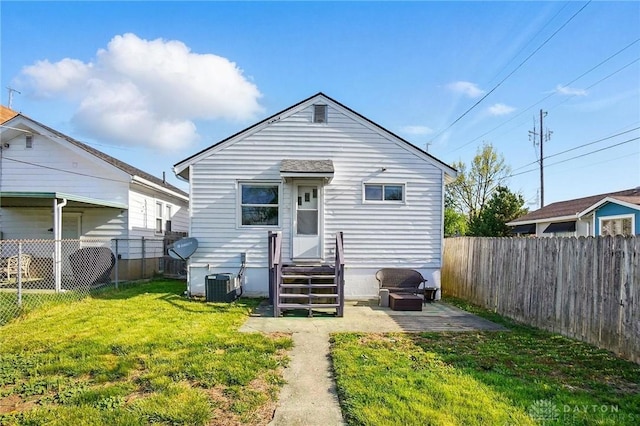 1708 Patterson Rd, Dayton, OH 45420 - back of house featuring central AC unit
