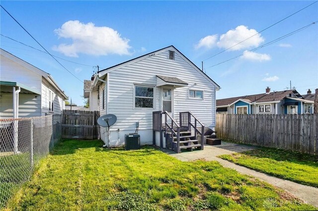 1708 Patterson Rd, Dayton, OH 45420 - rear view of property with central AC