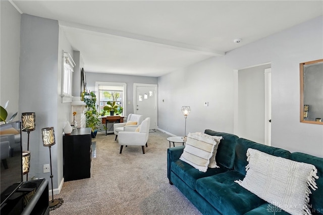 1708 Patterson Rd, Dayton, OH 45420 - living room featuring carpet, beam ceiling, and baseboards