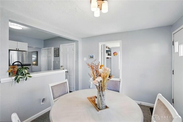 1708 Patterson Rd, Dayton, OH 45420 - dining area featuring carpet and baseboards