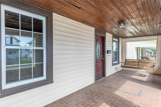 entrance to property with a porch