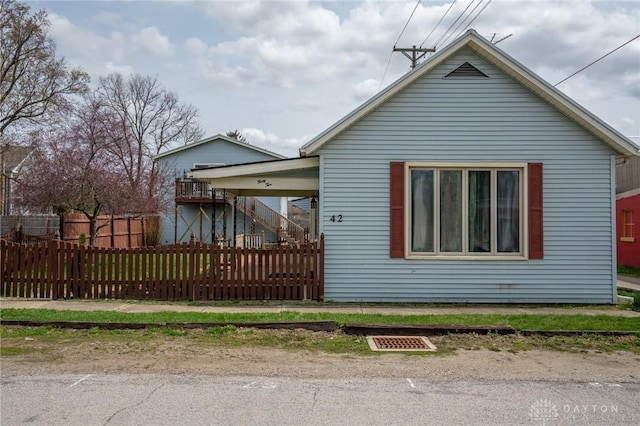 view of front of home featuring fence private yard