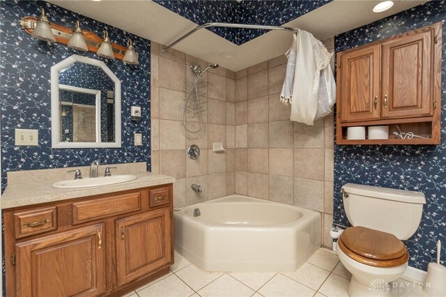 full bathroom featuring shower / tub combination, vanity, tile patterned floors, toilet, and wallpapered walls